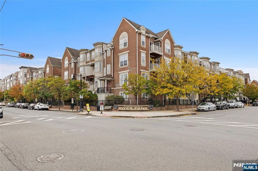 Absolutely Move-In Ready! This beautifully newly painted Gettysburg model townhome (approx. 1,225 sq. ft.) offers comfort, style, and convenience. First Floor: Spacious open-concept living and dining area, Gourmet kitchen with wood cabinetry, sizeable bedroom, full bathroom and private terrace, new plank flooring throughout. enclosed washer/dryer area. Second Floor: large ensuite bedroom with custom walk-in closets, master bathroom, high ceilings. The unit includes a one-car garage plus an additional covered parking space. Enjoy full access to community amenities. The property is surrounded by scenic waterfront promenades and located just minutes from Harrison PATH Station, with shuttle service available. Pet-friendly.