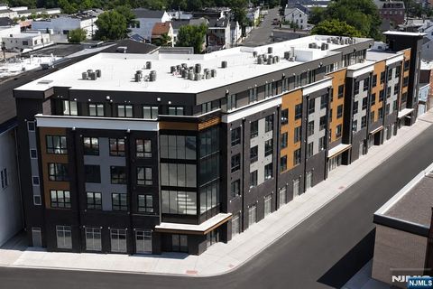 Photo of 587 River ST #204, Paterson, NJ 07524 (MLS # 26026883)