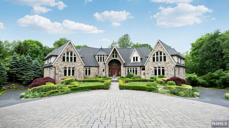 Welcome to this incredible approx. 15,000 sq. ft gated estate with 6 bedrooms, 8 full and 3 half baths situated on nearly 4 acres of meticulously manicured, private land. Enter through the foyer to find an amazing 2-story great room with fireplace, bay window, wet bar and wine cellar as well as a large formal dining room that is perfect for entertaining. The modern eat-in kitchen is complete with pantry, breakfast area and easy access to both the family room and solarium. The master bedroom suite with its own living room, large walk-in closet, private office and luxurious master bath completes the first level. The second level features 4 bedroom suites, family room with terrace, a library and an additional full bath. The full, finished lower level is truly a must see with an indoor heated pool with hot tub, spa with massage room, beauty salon, game and media rooms as well as a home gym. This fantastic estate also features 4 fireplaces, full house generator, heated driveway & more.