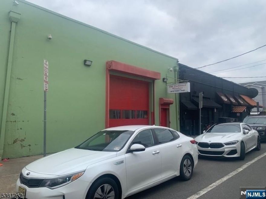 For Sale: 4,000 Sq Ft Warehouse in Newark's Ironbound Section. Don't miss this rare opportunity to own a 4,000 sq ft warehouse in the highly sought-after Ironbound section of Newark. This versatile space features 12"18 ft ceilings and a 12 ft overhead garage door, ideal for various industrial or commercial uses. Currently operating as a window manufacturing facility, the property offers flexible potential for investors or end-users. Adjacent properties at 168 & 170 McWhorter St are also offered individually or as part of a package deal. Prime location, excellent accessibility, and strong upside potential.
