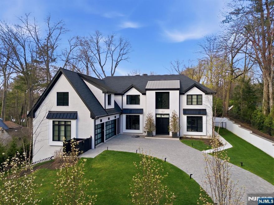 Set on a gated half-acre, this two-year-old new construction showcases exceptional craftsmanship by one of the areaâ€™s most prominent builders. A grand double-height foyer leads to an open floor plan with soaring ceilings and oversized European windows. Elegant living and formal dining rooms flow into a stunning family room with fireplace overlooking a private, fully fenced property with mature landscaping. The chefâ€™s kitchen features top-of-the-line appliances and connects to a mudroom and three-car garage. A guest suite with full bath and a designer powder room complete the main level. Upstairs offers a luxurious primary suite with walk-in closet and spa bath, three en-suite bedrooms, and a versatile lounge or office. The walk-out lower level impresses with sauna, cold plunge, wine bar, theater, gym, bedroom, steam shower, laundry, and expansive recreation space. Resort-style grounds include pool, jacuzzi, outdoor kitchen, and enclosed patio.