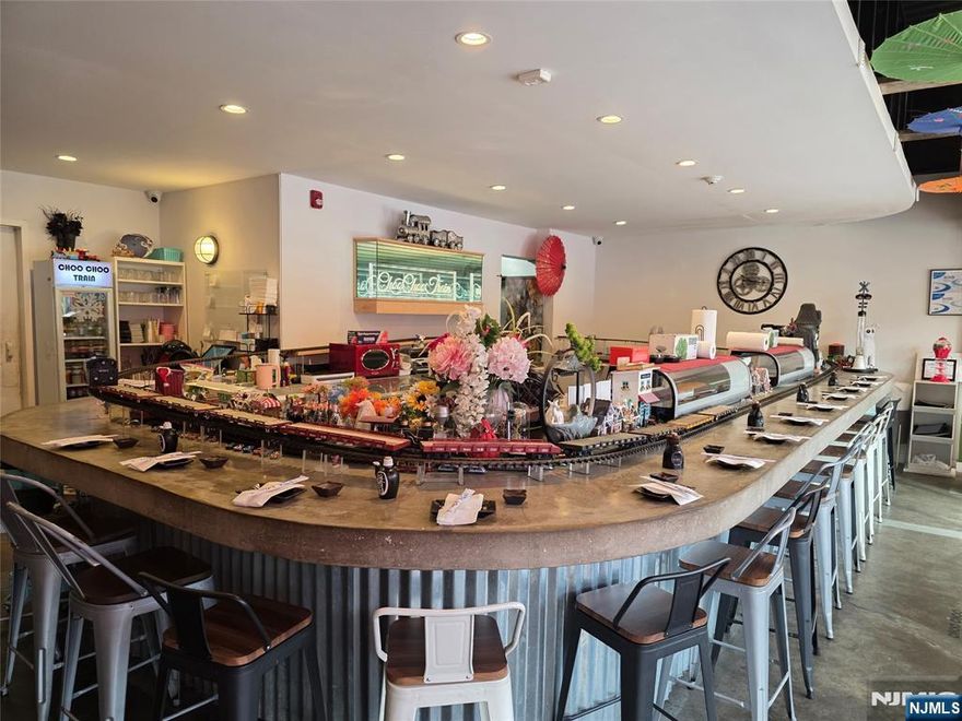 Good Location on Broad Ave. Great opportunity to take over the famous Japanese restaurant with steady sales volume over $1 mill, family & kids friendly. Sushi bar rounded with the train rail with the trade mark of sushi train. Two separate lavatories. All fixtures and equipment included in sale. Ample parking spaces on the street & municipal parking lot