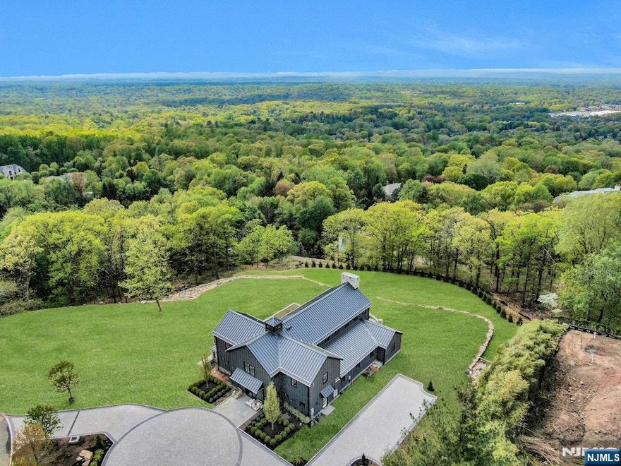 ON TOP OF THE WORLD!!! Perhaps the BEST 2 acre lot in all of Alpine that offers panoramic West and South views over the Northern Valley and New York City. A new construction 5,000 square foot barn style home was just completed as a guest house for 19 Autumn Terrace, the neighboring house across the cut-de-sac. This house can be expanded, or another home can be built on the property. A must see!
