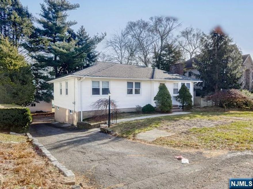 Welcome to 59 Herring Street, nestled in the charming town of Harrington Park, New Jersey. This home combines comfort, convenience, and an ideal location. This home offers ALL HARDWOOD FLOORS THROUGHOUT, NEW MODERN EAT IN KITCHEN W/NEW APPLIANCES, NEW BATHROOMS, NEW WINDOWS, NEW SIDING...a warm and welcoming atmosphere with the living room and wood burning fireplace. The standout feature is the 2-car garage, offering convenience and protection you vehicles...THE BEST BLUE RIBBON SCHOOL SYSTEM...CLOSE TO SCHOOL, LIBRARY AND NY TRANSPORTATION!