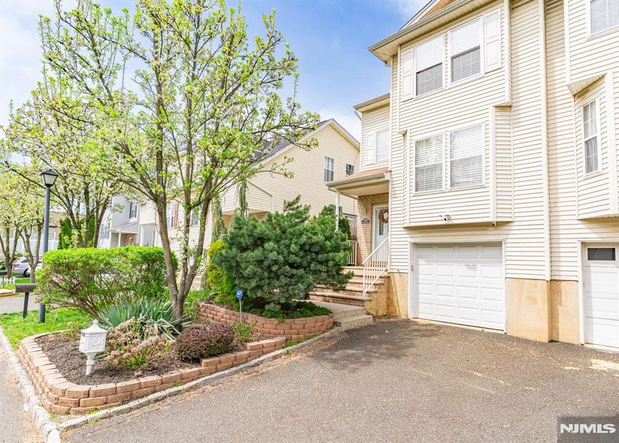 Welcome to this bright and spacious duplex, built in 2000 and RENOVATED beautifully! Flooded with natural light, this inviting home features an entry hall with a convenient coat closet, leading up to the main level with an open-concept living and dining room combo, a powder room, and an over-sized 24' x 11' kitchen with sliding doors that open to a landing and patio within the fenced yard perfect for outdoor entertaining. Upstairs, you'll find a generous 7' x 14' landing, ideal for a home office, complete with a double closet, along with two spacious bedrooms. The lower level features a finished rec room, laundry area, and direct entry to the built-in one-car garage. Enjoy the benefits of fee-simple ownership with no maintenance fees! Ideally located near Union High School and Burnet Middle School, and offering easy access to NYC transportation, Routes 22 & 78, the Garden State Parkway, local shops, and more, this home combines comfort, convenience, and excellent value. Come turn this house into a home before someone else does!