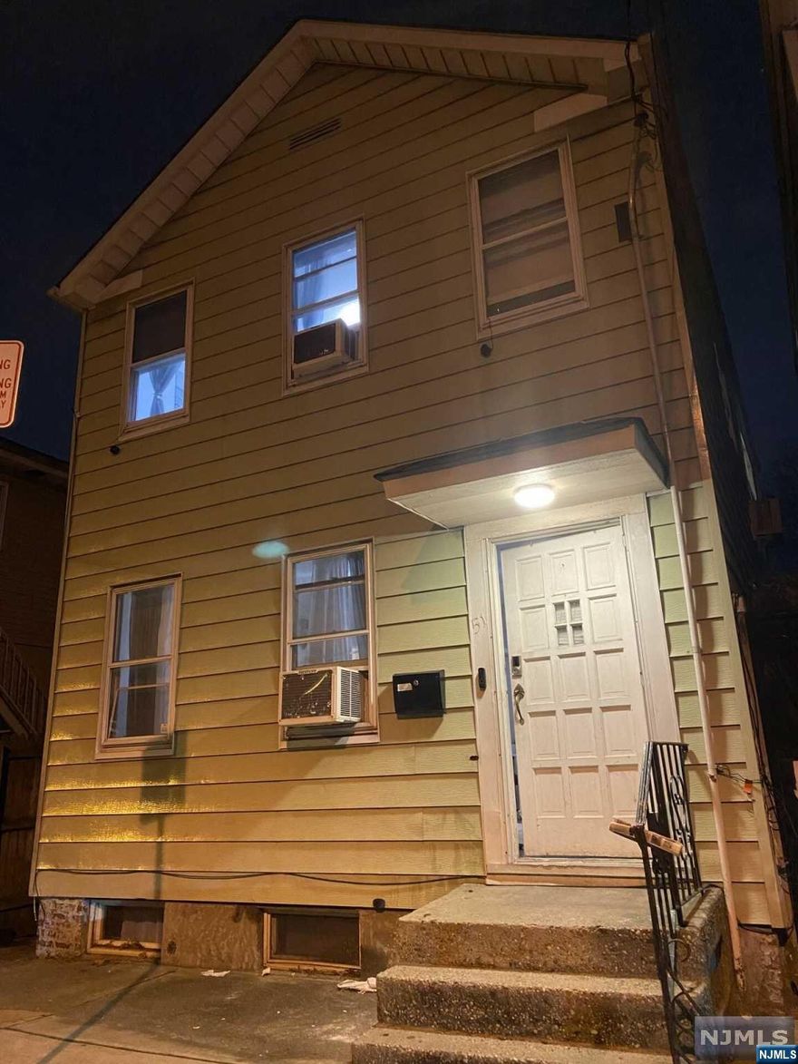Charming single-family home located at 51 Mott St in Newark, NJ. This historic property was built in 1900 and boasts a cozy atmosphere with 2 stories, 1 full bathroom, and 1 half bathroom. The home features a finished area of 1,080 sq.ft. and sits on a lot size of 1,237 sq.ft. Perfect for a small Household, this home offers a unique blend of character and modern amenities in a convenient location. Don't miss the opportunity to own this gem in the heart of Newark!.