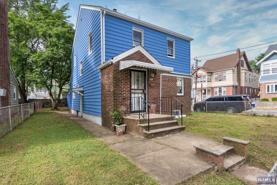 Price Reduction - Step into this spacious house which is warm and inviting, see yourself living in this beautiful house which was meticulously renovated. There is a large gorgeous kitchen w/ stainless steel appliances, new cabinets, granite counter-tops, new tiled floors with a huge pantry, 1st floor also has a den/office, large formal dining room, large and stunning living room and a powder room. Second floor has three bedrooms, a full beautiful spacious bathroom with shower and a bath. Hardwood floors were recently restored throughout the house. the electric panel was updated, plumbing was updated, new steam heating system and hot-water heater. Exterior of house was re-painted, large yard with privacy fence with two car garages plus another gate for additional parking for over sized vehicles, new roof, Many other updates!!