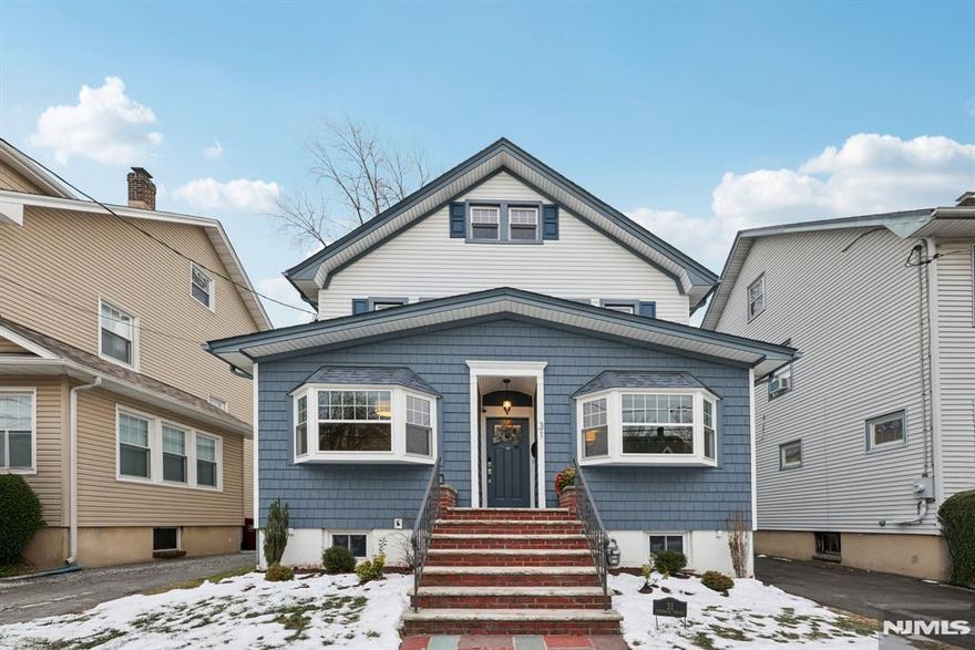 Welcome to 31 Fernwood Terrace, a captivating blend of classic charm and modern updates nestled in one of Nutley's most sought-after neighborhoods. This 3-bedroom, 2-full-bath home radiates character from the moment you arrive, offering an expansive layout that feels both grand and inviting. The main level boasts soaring high ceilings and a seamless flow designed for both daily life and elegant entertaining. Here, you will find a spacious living room, a formal dining room, and a cozy family room. For those who work from home, the dedicated den or office provides a quiet workspace, while the bright 3-seasons room allows you to enjoy the outdoors in comfort. On the second floor, a charming reading nook or sitting room offers the perfect spot to unwind.The current homeowners have meticulously maintained and enhanced this residence with premium upgrades, including a brand-new roof, siding, exterior doors, a vinyl fence, and new windows highlighted by two beautiful bay windows. Inside, the home features fresh paint, updated light fixtures, and new ceiling fans. The living space extends to a newly finished basement, perfect for recreation, along with thoughtfully added kitchen storage. For those looking to grow, the large walk-up attic presents huge potential for a primary suite or studio. Located just moments from the top-rated Yantacaw School, neighborhood stores, and convenient NYC transportation, this home is a rare find. You will want to check this one out!