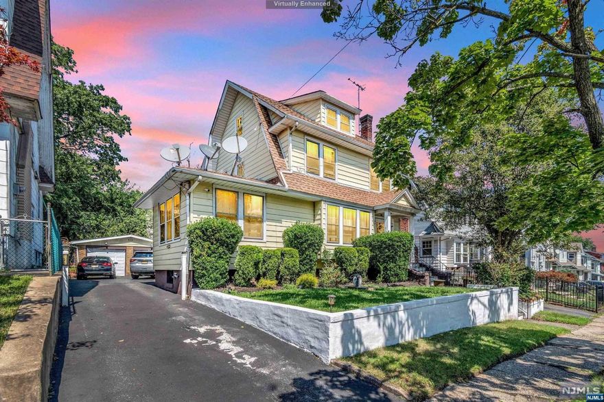 This splendid Irvington colonial home offers classic elegance and convenience. It features 3 bedrooms, 1 full bath, 2 half baths, and a spacious layout filled with natural light. The kitchen boasts stainless steel appliances, including a gas range oven, dishwasher, microwave, and washer/dryer. Upstairs, three charming bedrooms await, along with a full bath and two half baths for added convenience. The finished basement is versatile, ideal for recreation or a home gym, with a dedicated office space. Ample storage includes the attic and a two-car detached garage.