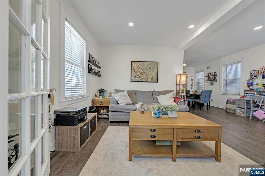 AVAILABLE APRIL 15! Renovated duplex features open concept living / dining room, new bathroom, 3 bedrooms, bonus sun room den, and kitchen with access to backyard and laundry room. Apartment includes floors 1 and 2, a private backyard with deck, 2 cars driveway, central air, washer, dryer, dishwasher, refrigerator, range and microwave. Sun-filled 1,300 sq ft home is located on a quiet street and 3 blocks to NYC bus stop, Ridge Road restaurants and shops! It's a short 5 minute drive to NYC train station, Shop rite, schools, etc. Renovated kitchen features Quartz countertop, subway tile backsplash, soft-close cabinets and SAMSUNG stainless steel appliances. No pets. No smoking. Rent includes water and sewer. Renter's Insurance required.