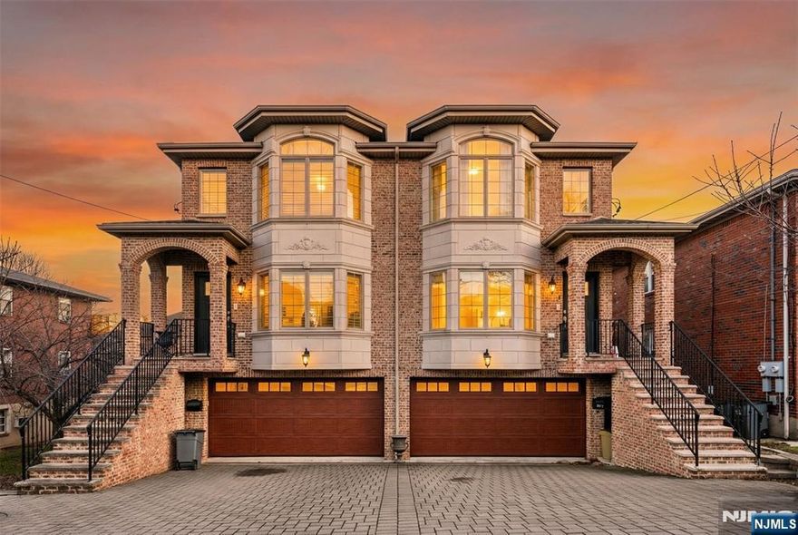 Welcome to 4bed 3.5bath Duplex nestled on The premiere location in the town. It's an ideal retreat away from the hustle and bustle, yet conveniently close to downtown broad ave. Features an open floor plan on the first floor with living room, kitchen, dining, and Family room w/gas fireplace, and sliding glass door to Deck. Second floor with master bedroom with walk-in closets plus three more closets. master bath w/free standing tub & shower & double vanity sinks, and two more good size bedrooms with full bath. Ground level features two car garage, Laundry room. 4th bedroom, full bath, w/recreation room. Separate entrance+sliding door to back yard. 4 blocks to NYC express bus stop, Commuter's Dream. Close to shops, and restaurants as well. ***Best and Highest due by 4/23/2026 12PM.***