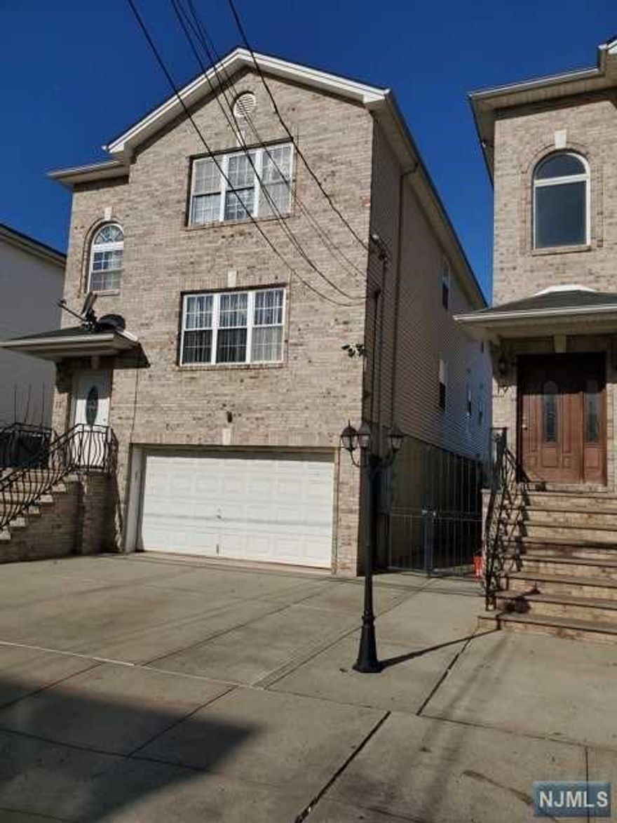 EXTRA LARGE YOUNG 2 FAMILY HOUSE BUILT ON 2007 WITH APROX 1550 S. F. EACH FLOOR BRICK FACADE UP TO THE TOP OPEN CONCEPT LAY OUT ON BOTH UNITS EACH FLOOR COME WITH 6 ROOMS 3 BEDROOMS & 2 FULL BATHS ALL HOUSE COMES WITH HARDWOOD FLOORS EXCEPT KITCHENS AND BATS WITCH CERAMIC CENTRAL A/C AND HEAT AND FINISHED BAYSEMENT WITH FULL BATH SEPERATE UTILITES AND LARGE BACK YARD AND THE BEST OF ALL SELLERS WILLING TO LOOK AT ALL REASONABLE OFFERS HURRY HURRY WILL NOT LAST