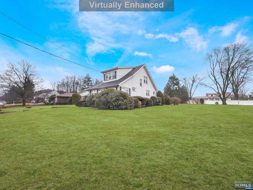 Charming 3 bedroom 1.5 bathroom Colonial on a large well maintained lot. Greet your guests into the large enclosed front porch. Currently being utilized as a home office. The porch leads into the living room with custom mantle. Large cased opening with wood columns lead into the formal dining room. Formal dining room is the perfect space to enjoy a quiet dinner at home or entertain your guests for any holiday meal. The eat in kitchen offering custom cabinetry and plenty of counter space to create all of your home cooked meals. Rear door leads to the spacious backyard. Half bath with laundry room completes the first floor. Retreat upstairs to find the primary bedroom with walk-in closet. Two add'l bedrooms and full bathroom equipped with tub shower and storage vanity. Full partially finished walkout offers family room, storage room and pantry. Backyard is partially fenced. Two detached garages, 1 1-car and 1 2-car. Ample parking