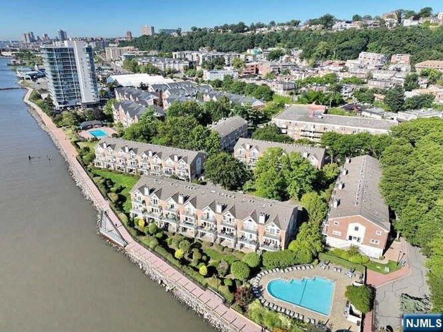 Experience luxury and convenience in Edgewater NJ. This newly renovated unit in a gated waterfront community features a bright open layout with new HW floors, Kitchen w/SS appliances and large island perfect for entertaining. Enjoy breathtaking panoramic views of the Hudson River and Manhattan skyline from the LvRm, primary Bed and terrace. En-suite, storage throughout, In-unit washer/dryer and reserved parking. The tree-lined Grand Cove community offers a resort-like setting w/a pool, clubhouse overlooking the Hudson River, fitness center with sauna, thoughtfully landscaped grounds, a riverfront promenade and walkway, desirable proximity to Manhattan via nearby transit.Btw the GWB&Lincoln Tunnel corridors, easy commute bus stop across the street, NY Waterway Ferry only a five-minute walk away, or shuttle connectors. Steps from Whole Foods,SoJo Spa, shopping, and waterfront dining, this unit delivers premier Edgewater living that perfectly balances suburban calm and urban connection. ***Best and Highest offers by Monday, January 5th, at 8:00 PM.***