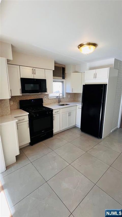 Photo of 12 Mina Ave #1st floor, Clifton, NJ 07011 (MLS # 26001930)