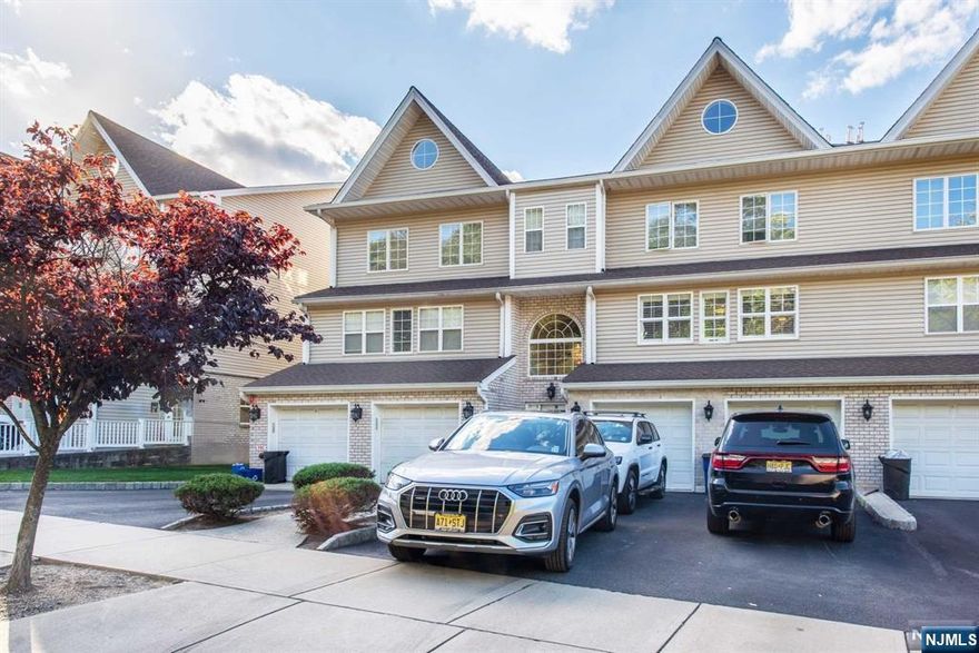 A MAGNIFICENT FIRST FLOOR CONDO, MOVE IN CONDITION, IMMACULATE, YOU MUST SEE. THIS CONDO IS LOCATED IN THE GARRET MOUNTAIN ESTATE AND PARK AREA. THE LOCATION IS PERFECT FOR THOSE THAT COMMUTE, BY TRAIN, OR DRIVE TO NYCITY. THIS OPEN FLOOR PLAN WITH A WALK OUT TO THE PATIO AREA TO GRILL OR RELAX OFFERS A PEACEFUL EXPERIENCE. WALKING, HORSEBACK RIDING, PICKEL BALL, ALL IN WALKING DISTANCE. THE FIRST FLOOR HAS A LARGE KITCHEN ALL NEW APPLIANCES. GAS STOVE GRANITE COUNTER TOP. WASHER AND DRYER LOCATED IN THE KITCHEN AREA. HARDWOOD AND TILE FLOORS THROUGH OUT THE UNIT. ALL UPGRADED LIGHTING, NEW AIR CONDITION, NEW GARAGE DOOR OPENER, AND HOT WATER HEATER. 3 BEDROOMS, 3 FULL BATHS ALL UPDATED AND BEAUTIFUL. THE MASTER BEDROOM OFFERS A LARGE AREA FOR A KING SIZE BED. THE MASTER BATH HAS A STAND UP SHOWER, JETTED TUB, WITH TWO SINKS. THE TILE IS METICULOUSLY SELECTED. THE WINDOWS HAVE CUSTOM PLANTATION SHUTTERS. THE TWO OTHER BEDROOMS SHARE A BATHROOM. BALCONY TO BE ENJOYED.