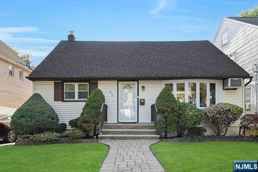 BEAUTIFUL UPDATED CAPE WITH REAR DORMER FEATS: 1ST FLOOR ,LARGE LIVING ROOM,UPDATED MODERN EAT IN KITCHEN, FORMAL DINING ROOM WITH SLIDING GLASS DOORS TO A LOVELY COVERED DECK. 2 BEDOOMS AND FULL BATH COMPLETE THE 1ST FLOOR. 2ND FLOOR OFFERS 2 LARGE BEDROOMS AND NEWER FULL BATH. BASEMENT IS HUGE AND SEMI FINISHED WITH SUMMER KITCHEN AND WALK OUT TO A LARGE BACKYARD. HOUSE HAS SOLAR PANELS IN THE REAR. OWNER ONLY PAYS $30.00 PER MONTH. 3 CAR DRIVEWAY. CLOSE TO EVERYTHING.