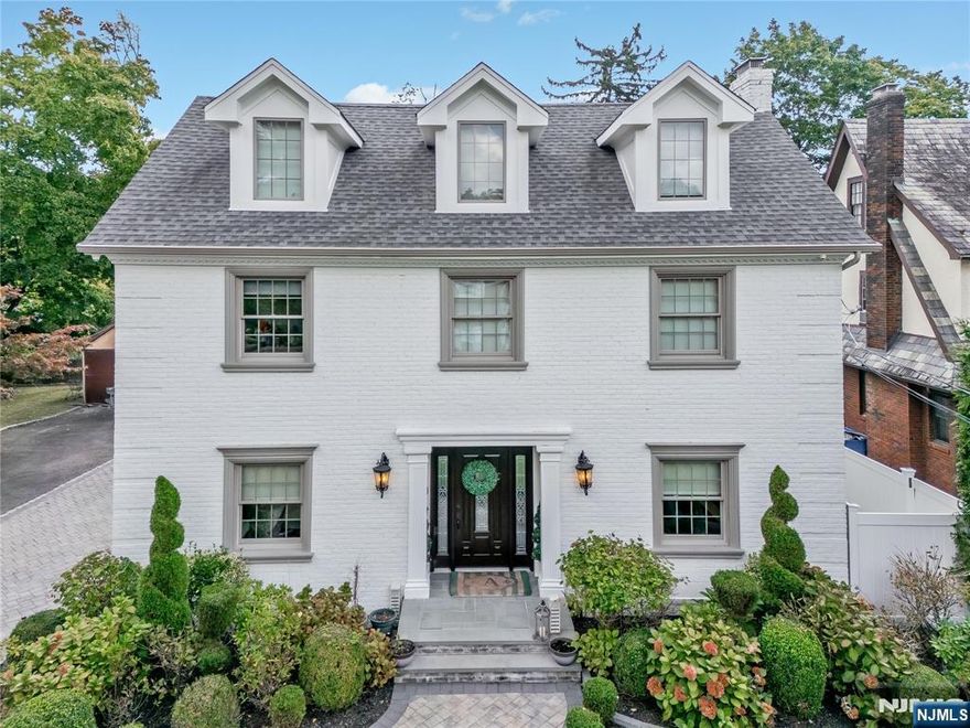Nestled in the heart of Englewood's coveted East Hill neighborhood,this magnificent 6 bedroom 4.5 bathroom gut renovated home offers the perfect blend of luxury ,comfort and convenience. Great open layout is perfect for entertaining. First floor offers gracious entry foyer, large living room with fireplace, dining room,walk in butlers pantry, gourmet custom chef's kitchen with center island, high end appliances and quartz countertops. Family room ,powder room and mudroom complete this level. Second floor offers primary bedroom with spa-like ensuite bath and large walk in custom closet .Two additional bedrooms, office ,bathroom and laundry. Third floor has 2 bedrooms and full bathroom. Walkout lower level offers large recreation space, additional bedroom, office ,full bath.Gorgeous hardwood floors,Porcelanosa tile,surround sound throughout. This home has beautiful private patio and gardens,2 car attached garage. Just 6 miles from NYC,close to houses of worship and transportation.