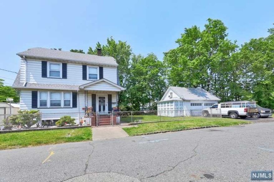 GREAT LOCATION, GREAT HOME, GREAT PRICE, LARGE COLONIAL HOME, LARGE LIVING ROOM, FORMAL DINING ROOM AND MEIK. 3 BR'S WITH STAIRS FROM ONE OF THE ROOM TO POTENTIALLY 4TH BR/OFFICE HIGH CELING ATTIC, FINISH BASEMENT, LARGE TWO CAR GARAGE/SUN ROOM WITH PLUMBING, HEAT AND ELECTRIC WITH A FINISHED "MAN'S-CAVE" ATTIC! TWO FAMILY ZONING. OIL TANK REMOVED AND HEATING SYSTEM REPLACED WITH GAS HEATING SYSTEM.