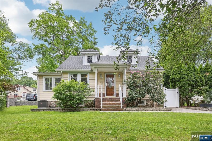 Welcome to this beautifully renovated Cape Cod-style home, perfectly situated in a community known for its charm, amenities, and convenience. The updated kitchen features new stainless steel appliances, granite countertops, and a stylish updated backsplash. The first-floor primary bedroom includes an updated full bathroom, Dining room, and Living room with bay window, detailed woodwork. Upstairs (2nd floor) offers two additional bedrooms. The walkout basement provides ample storage space. Enjoy the private, paved patio, two storage sheds, low-maintenance vinyl exterior and fencing, and dual driveways with parking for up to eight cars. Excellent curb appeal in a prime location near highways and NYC-bound trains and buses. (Not located in a flood zone). Additional features include: New appliances, Upgraded hardwood floors throughout, solid wood doors, good windows and roof, added light fixtures, well painted and maintained. This house needs nothing and is in ready to move-in condition. Don't miss the opportunity to own a solid home that will serve you well into the future while building equity.