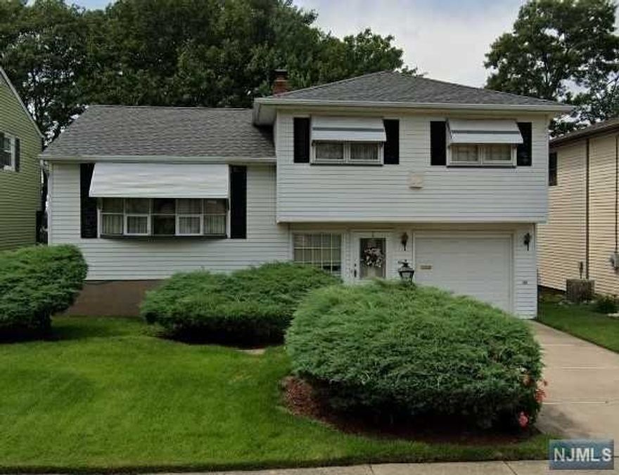 This private cul-de-sac offers you an opportunity to express your individuality in this 3 bedroom split level home with 1.5 baths. Some notable features include attached garage, hardwood under wall to wall carpet and central A/C. Ground level access to yard with scenic views.