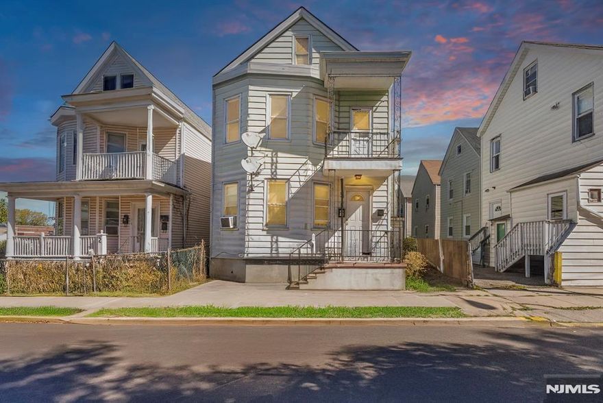 Ideally located just steps from downtown Clifton, this updated 2-family home offers strong rental potential, commuter convenience, and bonus living space rarely found in multi-family properties. Each unit features a spacious primary bedroom, two additional bedrooms, a compact living/dining area, full bath, and updated kitchens. Both interiors have been renovated, while the top-floor unit enjoys a small private balcony and exclusive access to a fully finished attic perfect for a home office, lounge, or storage. The clean, open basement houses utilities with two furnaces, two water heaters, and separate meters. All appliances are included, and the property is lead-safe certified. Whether you're an investor seeking turnkey income or a buyer looking to live in one unit while renting the other, this home delivers on location, layout, and long-term value all just moments from Clifton shops, restaurants, and transit.