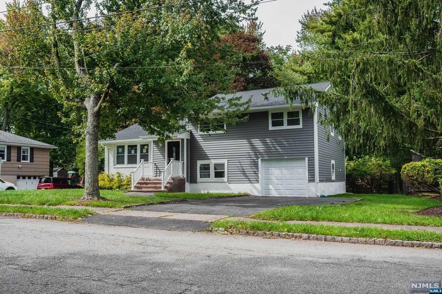 You'll love this 3 bedroom, 2 bath home with 4 parking spots! Spacious and Modern, this home has been recently renovated with new floors, fresh paint, and stainless steel appliances. The gas range and center island kitchen will make cooking for your family a breeze. The sleek quartz counter tops will give you that modern touch you've been looking for. All of the bedrooms have hardwood flooring and there is even a deck for you to enjoy the outdoors in your backyard. This home has central air and forced hot air heating. Contact us today to book a viewing!