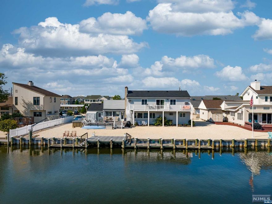 Loveladies Harbor is a lagoonfront community on the north end of LBI. Home is waterfront on lagoon, within walking distance to guarded beach, with bathrooms, tennis, and outdoor shower. Option to join the LHO association, which offers private parking at the beach. Public parking available as well. 3 miles to the famous Old Barney Lighthouse. Quaint towns with great places to eat & socialize within 3 miles. Easy access to bay; lagoon is great for motorboats, sailboats, kayaks, paddleboards, and swimming. Plenty of off-street parking for owner and guests, Easy/low-maintenance pebble yard, professionally landscaped garden. in-ground sprinklers installed and can be activated. House is lagoon front in Loveladies, with 100' bulkhead and extended docks. Please call agent. House will be occupied and need to notify occupants. Ann Carletta 201-914-1997. House is available to see, but is in the probate process and expected closing date avail is Sept/Oct.