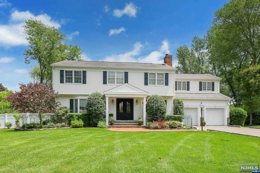 Pristine,impeccable 5 bedroom,2.5 bath colonial situated on .63 acres of spectacular property in sought after Wyckoff.The main floor boasts an elegant living room,oversized formal dining room &a cozy library with wood burning fireplace.The renovated gourmet kitchen features custom cabinetry,top of the line appliances,center island,quartz counters,marble tile backsplash&separate dining area.The kitchen opens into the sun drenched great room with vaulted ceiling,gas fireplace&French doors leading out to Trex deck overlooking backyard oasis with inground pool surrounded by exquisite landscaping&mature trees for the utmost privacy.A mudroom&powder room complete the first floor.Upstairs features a master bedroom suite with a vaulted ceiling,large walk-in closet,sumptuous renovated master bath with soaking tub, double vanity&stall shower.4 additional bedrooms&updated main bath.Lower level houses a rec room,home office,laundry rm&gym.Too many amenities to list!