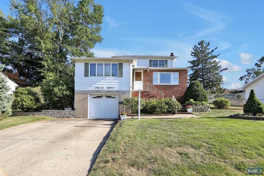 Welcome to this lovely colonial in the heart of the Milnes section of Fair Lawn. Every inch inside and out has been meticulously maintained. On the main floor you'll find a large and bright living room, leading to a beautiful eat-in kitchen w/sliders leading outside to a charming awning-covered porch where you can enjoy outdoor time. Continue around from the kitchen to a very spacious dining room w/wide picture window. This first floor also offers a full bath, and a nicely sized bedroom with a walk-in closet. Upstairs are 2 more bedrooms and a full bath. The partially finished basement with utility and laundry is great extra space. Close to NYC transportation, dining, shopping and more! Wonderful house with plenty of possibilities.