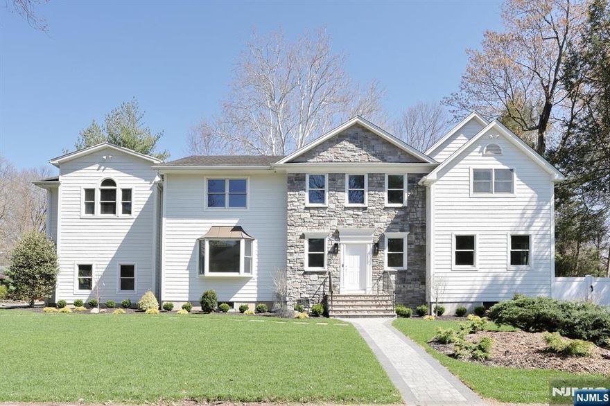 THIS STUNNING HOUSE HAS ALL NEW 5.2 BATHROOMS WITH NEW TILE,VANITIES,KHOLER PLUMING FIXTURES, TOILETS. KITCHEN HAS ALL NEW CABINETS,APPLIANCES,SINKS AND FAUCETS. NEW HEATING & COOLING SYSTEMS WITH NEW DUCTWORK .NEW LAUNDRY ROOM AND NEW LG WASHER/DRYER. ALL NEW LIGHTING ,ELECTRICAL OUTLETS AND SWITCHES. NEW CLOSET SYSTEMS. NEWLY FINISHED BASEMENT. NEW ALARM AND SONOS SPEAKER SYSTEM ADDED. , NEW LANDSCAPING, PAVER PATIO AND FENCE. NEW PAINT AND REFINISHED ALL HARDWOOD FLOORS. RADIANT HEATING SYSTEM AT KITCHEN FLOOR AND PRIMARY BATHROOM FLOOR. TOTAL7288 SQUARE FOOT.(1ST FLOOR;2724,2ND ;2684,LOWER;1880) THE MAIN LEVEL FEATURES A 2 STORY FOYER. FORMAL LIVING & DINING ROOMS. FAMILY ROOM/FIRE PLACE. ALL NEW MODERN KITCHEN DESIGN AND QUALITY. BUTLER'S PANTRY. SECOND FLOOR HAS PRIMARY BEDROOM WITH FULL BATH/RADIANT HEAT FLOORING. 2 WIC, BR/BATH,BR/BATH, BR/BATH/OFFICE FROM OUTSIDE ENTRANCE.GOOD FOR THE IN-LAW SUITE. THE FINISHED LOWER LEVEL OFFERS REC. AREA,OFFICE,FULL BATH,MOVIE ROOM AND STORAGE. OFFERING AWARD WINNING SCHOOLS,CLOSE TO SHOPPING,DINING AND NYC TRANSPORTAION !!!