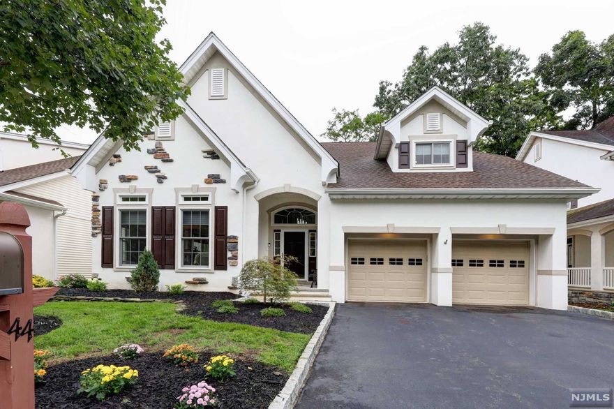 Welcome to the pristine colonial at the Ramapo River Reserve. Fall in Love with all the Beauty that this home has to offer. Entire Home freshly painted, brand new trim work throughout, all Hardwood floors refinished, new flooring in basement, kitchen cabinets refaced, new kitchen sink and fixtures, powder rm redone, New Hunter Douglas Cordless shades and Custom Closets. The Open Floor Plan leads you to the Formal Living Rm and Dining Rm. Facing the back of the house enjoy the Comfort of the Eat in Kitchen with separate Dinette and Family Rm w/a Fireplace and Sliders to the Upper deck. Laundry Rm, Powder Rm and entry to a 2 Car Garage completes the first fl. Second fl has a Master Bdrm and Spa Master Bath that dreams are made of. Two additional Bedrms and Full Bath. The Sunlit basement has a Family Rm with Sliders to the Lower Deck, Fully functioning Sauna and a Home Office. Enjoy the Peacefulness of the Outdoors and all its Beauty. All this and close to NYC and so much more....