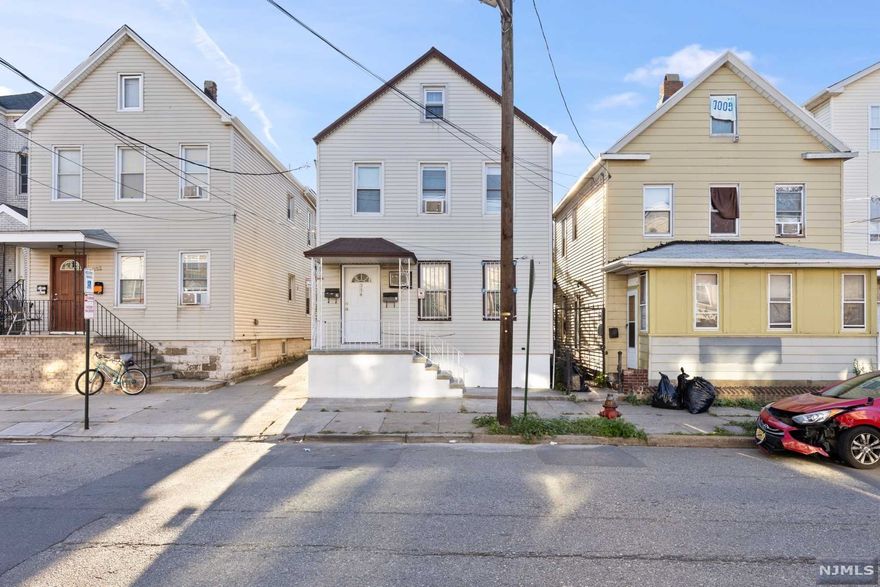 Incredible opportunity to purchase this well maintained two-family home. The large floor plan offers endless possibilities for an owner-occupant or investor, with the bottom floor unit featuring 2 bedrooms, 1 bath, living room, dining room, and eat in kitchen. The top floor unit features 2 bedrooms, 1 bath, living room, eat in kitchen and fully finished attic with half bath. Great lot size with private parking and extra large garage. Conveniently located near public transportation, access to major highways, shops, restaurant, and parks.