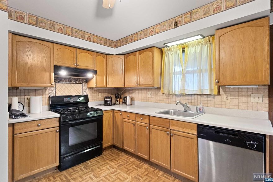 Home sweet home just got sweeter! Welcome to this well maintained single family property, waiting for its newest owners! Featuring four bedrooms and two baths, once you enter the sundrenched interior, you are sure to fall in love. The spacious layout including an open living and dining room, as well as large kitchen with ample cabinetry allows for all the best comfort. Generously sized bedrooms, gleaming flooring and a full unfinished basement add to its allure. Situated on an expansive corner lot with private parking, as well as nearby to shops, restaurants and easy transportation. This is the one you've been waiting for!