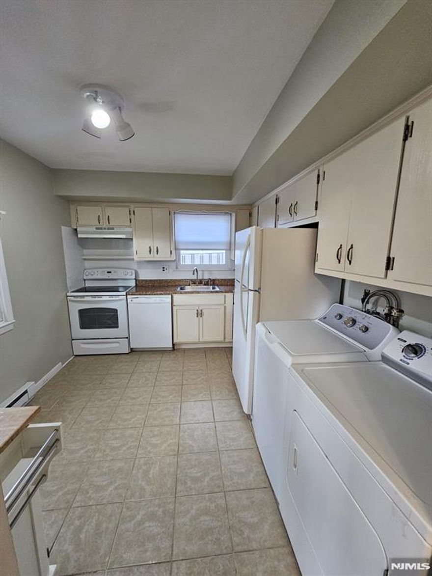 Spacious two-story home featuring a bright living and dining area, a well-equipped kitchen, and a half bath on the first floor. The second floor offers three large bedrooms and a full bath. Enjoy the convenience of an in-unit washer and dryer, wall A/C units, and the option to bring your own window A/C units. The fenced-in backyard provides outdoor space for relaxation. One driveway parking spot is included. Tenant is responsible for electric and cold water. Home is located in a flood zone. Available April 1. No pets.