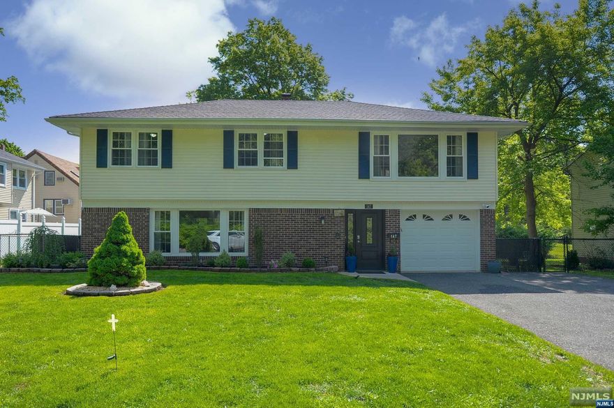 Nestled in a sought after neighborhood in New Milford, this home will not disappoint you. As you enter the large foyer, you will step into a substantial size family room. The lovely eat-in kitchen has been recently updated, with center island and stainless steel appliances, with sliding glass doors to a beautiful deck. Additional features include; four generous size bedrooms, formal dining room, and living room. Enjoy entertaining in the extensive backyard.