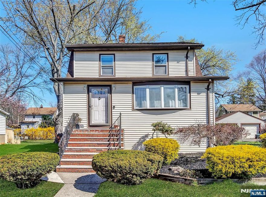 Welcome to this charming home for sale in Dumont! This beautifully maintained property features 3 bedrooms and 2 full baths, offering plenty of room for comfortable living. The large kitchen is a standout, showcasing custom cabinetry and an open design that seamlessly flows into the dining room and living room, making it perfect for entertaining guests. The dining room features sliding doors that lead out to an oversized deck, overlooking the private backyard. Upstairs you will find 3 bedrooms and a full updated bath. The full finished basement adds extra versatility to the home with a separate entrance, den, bonus room, summer kitchen and a full bathroom. Additional features include a large 2-car detached garage for plenty of storage and parking. This home is ideally located with close proximity to transportation options, including the NJ Transit bus line. Donâ€™t miss out on this fantastic opportunity to own a home in a desirable Dumont neighborhood!