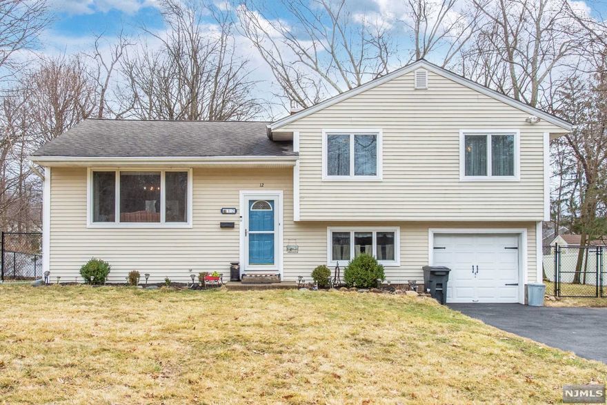 Move right in to this 3 bedroom, 2 bath split level on a great street in Oakland. The open concept first floor consists of the living room, dining room, and gorgeous kitchen with granite countertops and wood cabinets. Sliding glass doors lead to a deck perfect for entertaining. Upstairs you will find the bedrooms and updated bath. Head downstairs to a cozy den, another full bath and laundry. The large yard feels secluded and includes an underground sprinkler system. Hardwood floors, a wide driveway, multi zone heat and central air make this the perfect place to call home. Don't miss this one! Deck AS-IS, no known issues. Contingent on seller's finding a new home. Actively looking! BEST AND FINAL DUE WEDNESDAY 3/2 AT NOON