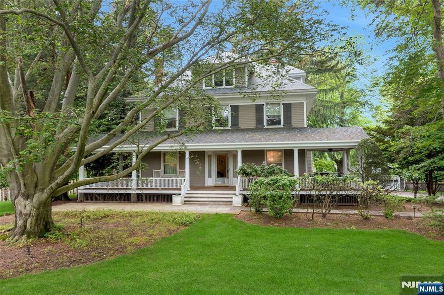 Experience timeless elegance in this 3,500 sq ft Victorian Colonial, circa 1901, set on 1.3 acres in Demarestâ€™s sought after County Road enclave. This is no cookie cutter new home but classic charm refined for todayâ€™s lifestyle. Enter through the newly built wraparound teak porch with ceiling fans and soft lighting, creating the perfect setting for breezy summer evenings. Inside, high ceilings and wood floors flow throughout a grand foyer leading to the library, living room with fireplace, formal dining room, and a sun filled great room addition with walls of windows and a second fireplace, designed for modern living. The kitchen offers Sub Zero appliances, abundant cabinetry, a side island, and glass sliders to the outdoor wood deck, also accessible from the great room, ideal for entertaining. Upstairs provides two bedrooms and a full bath, while the primary suite offers a new spa bath. The third floor features two additional bedrooms and a full bath. Two zone air conditioning with a brand new unit for the second and third floors, sprinkler system, detached two car garage, and a flat fenced yard complete this rare offering. Steps to Wakelee Field, playground, duck pond, center of town, schools, and NYC transit. Demarest is a top Niche-ranked community with outstanding schools and a true neighborhood feel.