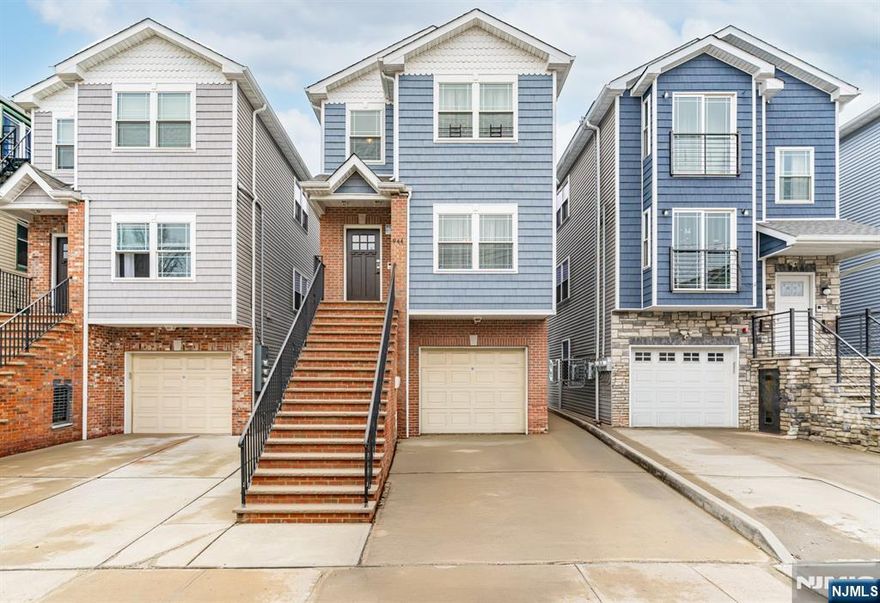 Newer-built semi-custom two-family located in a desirable section of Elizabeth. Well maintained with hardwood floors, central air, and open-concept living and dining areas. Modern kitchens, spacious bedrooms, and excellent natural light throughout. Ideal for owner-occupants or investors seeking a low-maintenance property with strong rental potential. Conveniently located near transportation, shopping, and major highways.