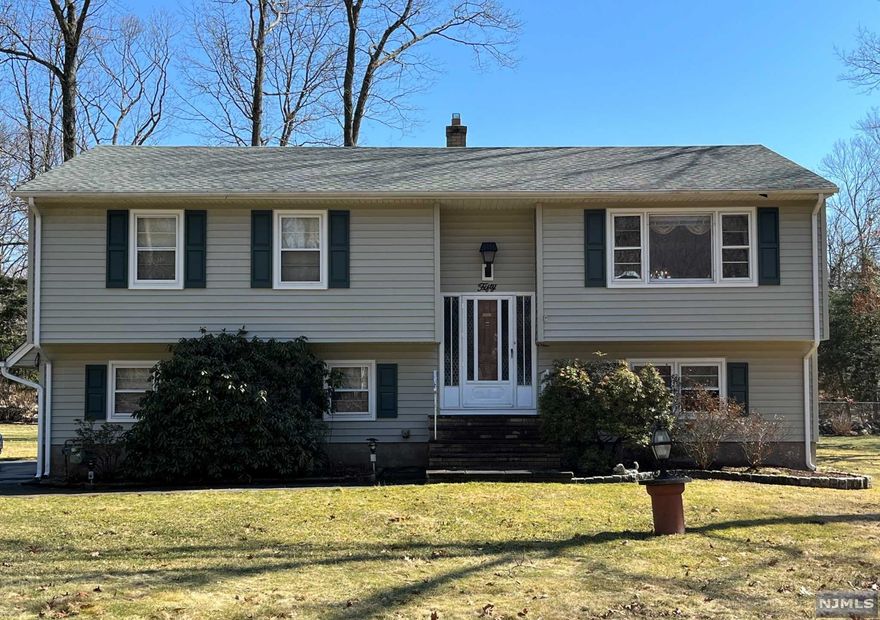 Welcome home to 50 Newland Drive! Enter into the foyer, and walk upstairs to the living room & dining room which feature large windows and glass sliders onto the deck. The eat-in kitchen offers plenty of space to cook your favorite meals and bake your favorite treats! Appliances are being sold as-is. There is a door leading from the kitchen to the spacious deck. Down the hallway, you will find the main bathroom. The large master bedroom is down the hall, as well as 2 other decently sized bedrooms. Please note that there are hardwood floors underneath the carpets. Downstairs is a family room, full bath/laundry room and office/bonus room. The family room has sliders that lead to a slab patio which is directly below the upstairs deck. Beautiful yard & outdoor space! Will not last!!
