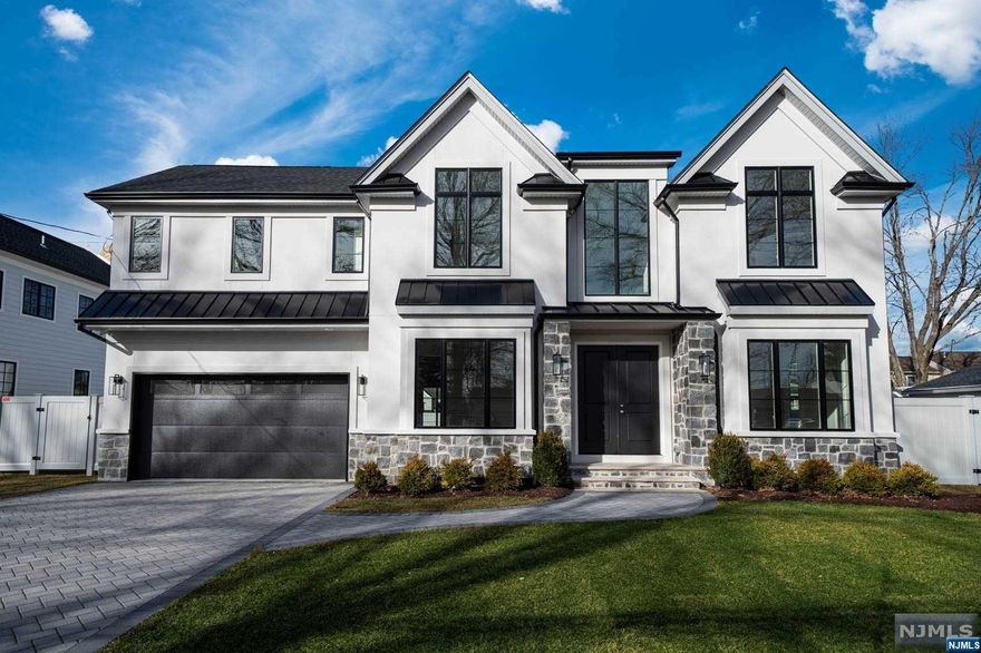 BRAND NEW CONSTRUCTION CUSTOM masterpiece on the ULTRA-DESIRABLE East Side of Paramus. Designed by award-winning Architect Robert Zampolin & built by one of the TOP Builders in Bergen County. Upon completion, this 6,400+ sq ft home will feature 6 bedrooms & 6.5 bathrooms (each bedroom features en-suite bath + WIC). Dramatic 2 story foyer greets you upon entry. Kitchen boasts designer cabinetry & professional grade appliances. Great layout w. LR/Library, DR, Butler's Pantry, Breakfast Area, Guest Bedroom Suite, & HUGE great room on the first floor. Walk-In Pantry + custom mudroom. Upstairs, the Primary Suite features a gorgeous primary en-suite bathroom plus MASSIVE Double Walk In Closets. Laundry on 2nd floor for your convenience. Dream Basement w. all of the amenities! Movie Theater, Gym, Bedroom, Full Bath, & Huge Rec Room. 2 Car Garage. Do not miss this stunning brand new home. AMAZING SCHOOLS! Lawrence Dr is a beautiful & quiet street full of new construction homes.