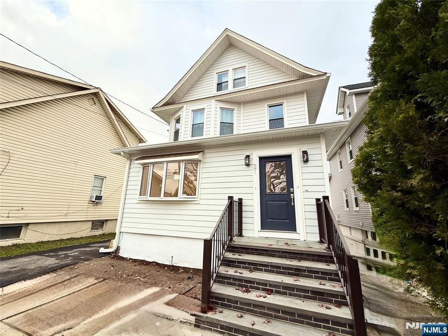 JUST RENOVATED, Excellent location just steps walking distance from the NJ Transit bus to NYC and close to the Lyndhurst train station, shopping, restaurants, and parks. This spacious first-floor unit of a two-family home feels like renting a single-family house and offers 3 good-size bedrooms with a very large master bedroom, a living room, a large eat-in kitchen, ample closet space, ceiling lights throughout, plenty of windows that fill the home with natural daylight, and a comfortable, all-on-one-floor layout for easy living. The unit has been fully renovated with brand-new kitchen cabinets with granite countertops, new hardwood and tile floors, new and newer appliances, a new deck, and modern finishes. Additional features include an extra-large private backyard for your exclusive use, a large entrance foyer, skylight, laundry hook-up in the unit, and a long driveway. Move-in ready and beautifully updatedâ€”a must-see rental in a prime location!