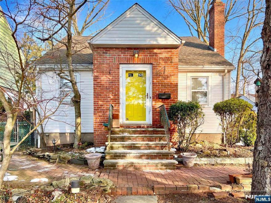 The search for your next home is over! This 3/4BR cape/colonial has been lovingly cared for and is full of potential. This is your chance to unlock the endless possibilities in the great town of Bergenfield. You'll enter into the large living/dining room featuring hardwood floors with plenty of space to entertain. The kitchen has loads of potential and is waiting for your updates. The first floor is complete with a full bath and an expanded bonus room or 1st floor bedroom (w/walk-in closet) depending on your needs. Upstairs the second floor features 3 additional bedrooms with hardwood floors, full bath, and attic space. Downstairs the unfinished basement has an area for laundry, utilities, and storage. Outside enjoy the many perennial flowers, detached 1 car garage, and ample parking in the large driveway. This house is in a prime location close to parks, schools, transportation, and shopping. Come and make this charming home yours!