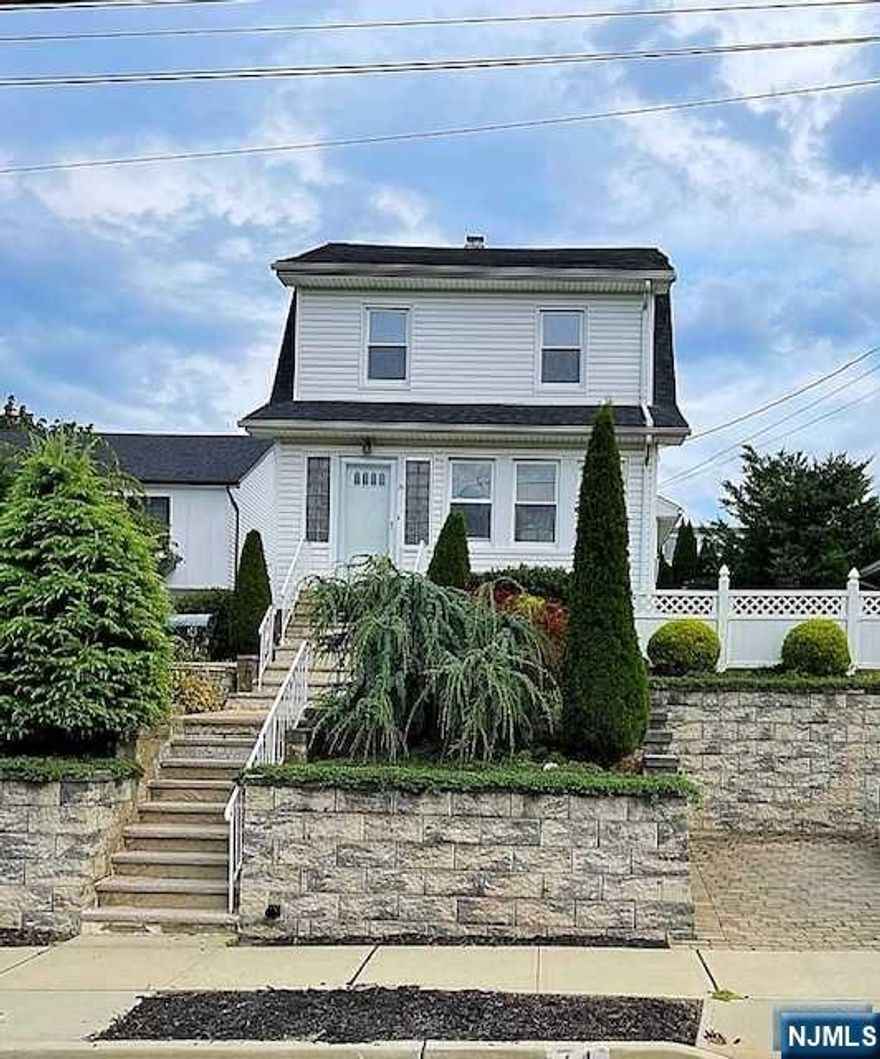 Move into your new home for the new year! This home is located in one of the best towns in Bergen county! Come see this gorgeous and zen home for sale in WoodRidge. This home features beautiful landscaping, three bedrooms, a bonus room, two full bathrooms, living room, dining room, eat-in kitchen, sun porch and a full walk up attic. The back door leads you out into your own little oasis with a large heated pool and a tranquil side yard. Full basement with tons of storage and rooms. Perfect for all families! WoodRidge is close to major highways, public transportation, shopping, American Dream and NYC. It's also near many parks and recreation areas. WoodRidge has its own police force, fire department, and an exceptional school district making it a great town for families to call home.