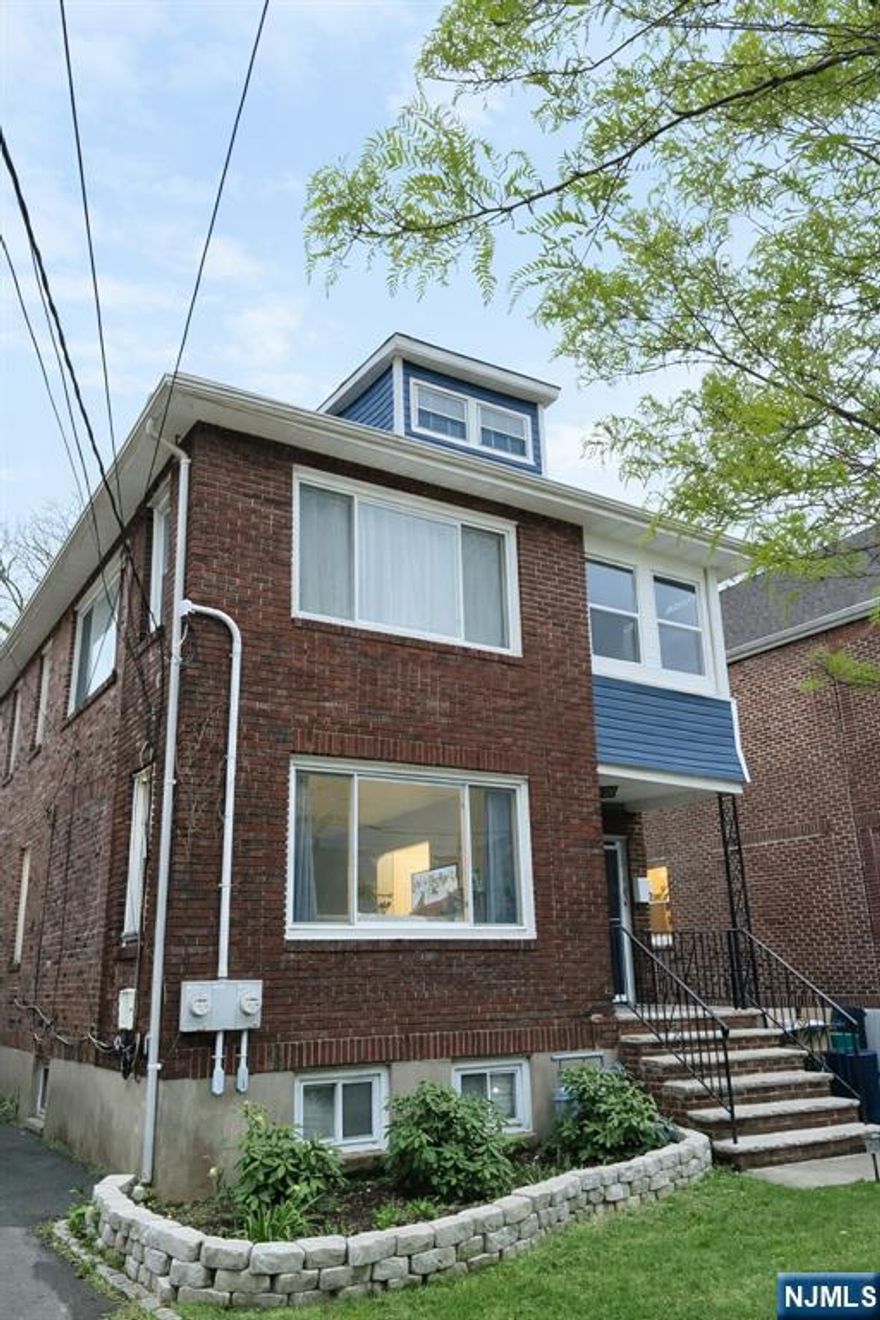 Welcome to this beautifully renovated 2-bedroom, 1-bath first-floor unit in the heart of Nutley. This home offers an abundance of natural light throughout a spacious, open-concept layout flowing from the living room into the kitchen and dining area â€” perfect for modern living and entertaining. The bright living room provides plenty of space to relax or host guests, while the updated kitchen opens seamlessly to the dining room for effortless flow. Enjoy parking with rear access and convenient washer/dryer hookups inside the unit for everyday ease. Additional parking available upon request. Additional basement storage offers extra room for your belongings. Located just steps to Yanticaw Park, a cherished Essex County park with trails, green space, and recreational amenities, and close to Nichols Park â€” both ideal for walks, outdoor fun, and community living. Shops, dining, and local conveniences are within easy reach, giving you the best of Nutley living.