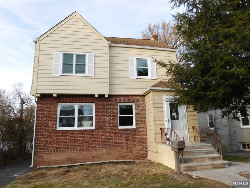 Highly demanded Colonial in Oakview section of Bloomfield. Walk to blue ribbon Oakview elementary school. NYC bus on block. Quick access to GSP, Rt.3, Rt.46, Rt.80. Only 20 mins to NYC. Renovated with NEW kitchen, SS appliances, bathrooms, lightings, floorings, windows, doors, driveway....etc. Finished basement with new tiled flooring and new washer/dryer. Finished high ceiling attic for storage. Spacious and bright rooms throughout this home. Come enjoy and relax on the newly tiled patio off from kitchen. Don't miss it.