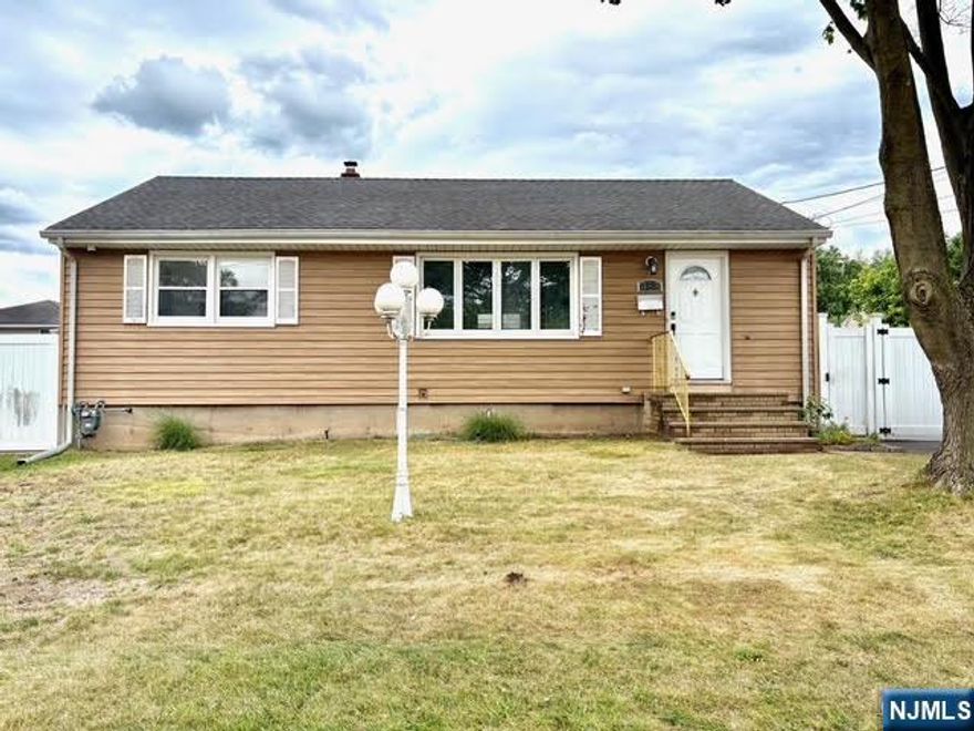 Welcome Home to this lovely Ranch style home offering a Brand-New Kitchen, Formal Dining Room, Large Living Room, Full Bath Lower level is a potential in-law suite with a full bath or if you need a home office you have one right here. TONS of Storage, washer and dryer. Fully Fenced Back yard with a detached garage and parking for 4 cars in the driveway