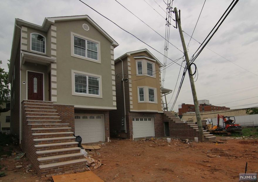 You will be pleasantly surprised by all the standard upgrades in this project. 3 Beds, 2 baths, master suite w his her closets. Large liv area setup as open space to include: kit, liv room, din room & balcony access. Enjoy all the modern amenities & energy efficient construction. All fenced-in property. Quality Oak hardwood floors throughout. Excellent floor plan. Sliding door to deck. 10 year warranty included! Granite exterior steps. Come see it today. We will meet you at the front door!