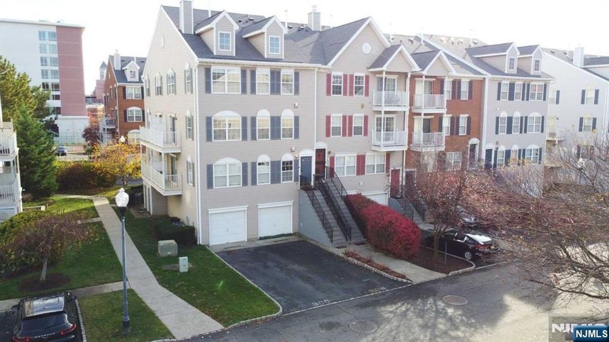 Welcome to 252 Matthews Drive, an exceptionally renovated and beautifully designed townhouse in the highly coveted Society Hill neighborhood. This bright and spacious corner unit boasts 3 bedrooms, 2.5 bathrooms, and sought-after double exposure windows, flooding the home with natural light throughout the day. The thoughtfully designed open-concept layout caters to modern lifestyles, highlighted by an updated eat-in kitchen equipped with custom cabinetry, premium stainless-steel appliances, and a private balcony perfect for morning coffee or evening relaxation. This home offers an array of features designed for comfort and convenience, including central air for year-round climate control, ample storage space throughout the home, a private garage and additional driveway parking, access to exclusive community amenities, such as a swimming pool, tennis courts, and a clubhouse. Ideally located for both commuters and urban enthusiasts. Make this stunning home your own!